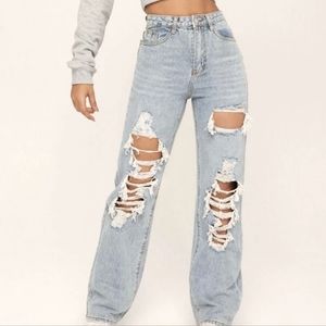 Light wash distressed straight leg mom jean size 12/14 Never worn.